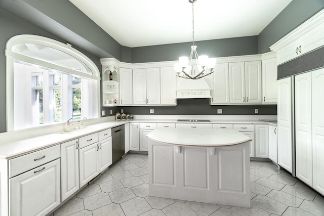 kitchen with white cabinets, light countertops, dishwasher, open shelves, and decorative light fixtures