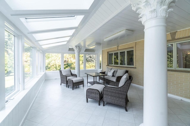 sunroom / solarium with lofted ceiling with beams and decorative columns