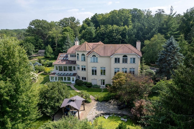 drone / aerial view with a forest view