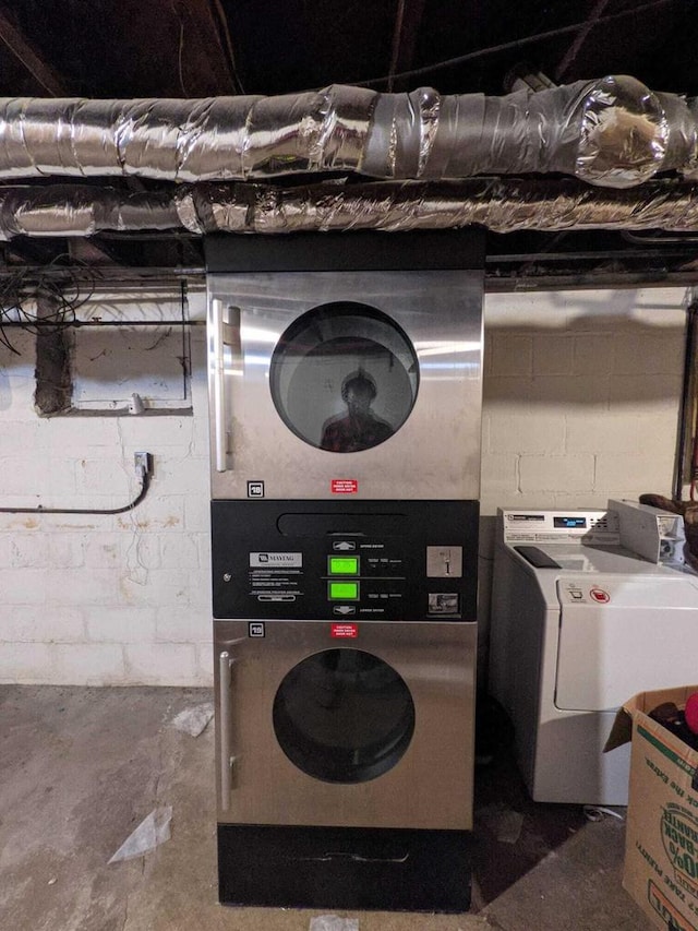 laundry room featuring washer / clothes dryer and laundry area