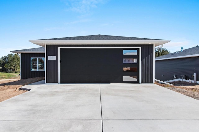 garage featuring driveway