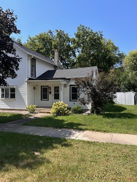 view of front of home with a front yard