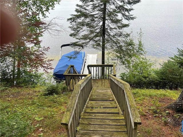 dock area featuring a water view