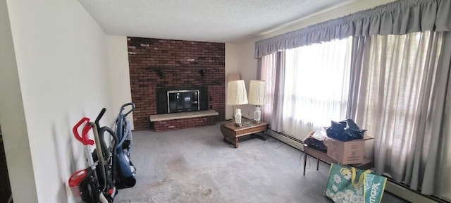 carpeted living room with brick wall, plenty of natural light, a brick fireplace, and a textured ceiling