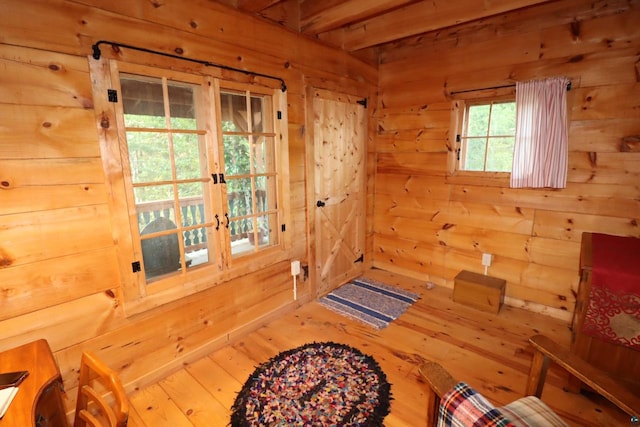 living area with wood walls