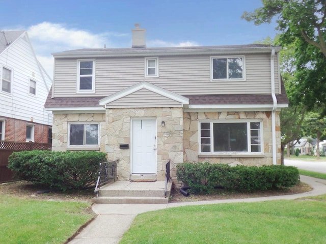 view of front facade with a front lawn