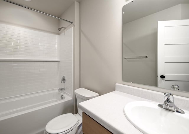 full bathroom with vanity, shower / bath combination, and toilet