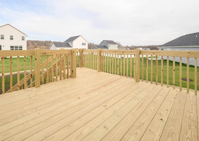 deck featuring a lawn