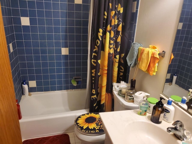 full bathroom featuring shower / tub combo, vanity, and tile patterned floors