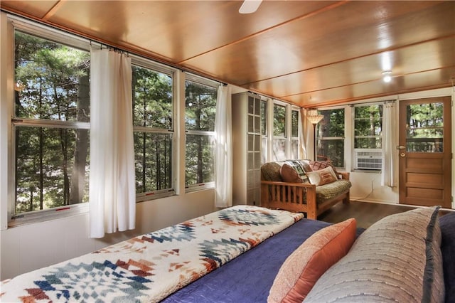 sunroom / solarium featuring a healthy amount of sunlight