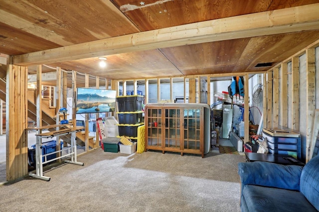 basement with carpet floors and wooden ceiling