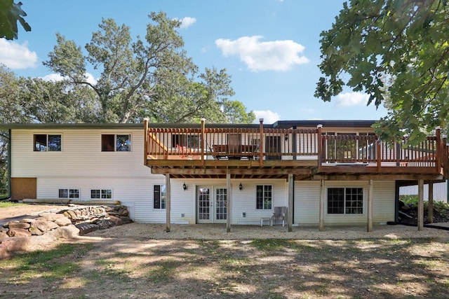 rear view of house featuring a deck