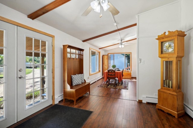 interior space featuring a baseboard heating unit, ceiling fan, and dark hardwood / wood-style floors