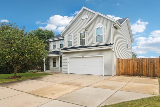 view of front of property featuring a garage