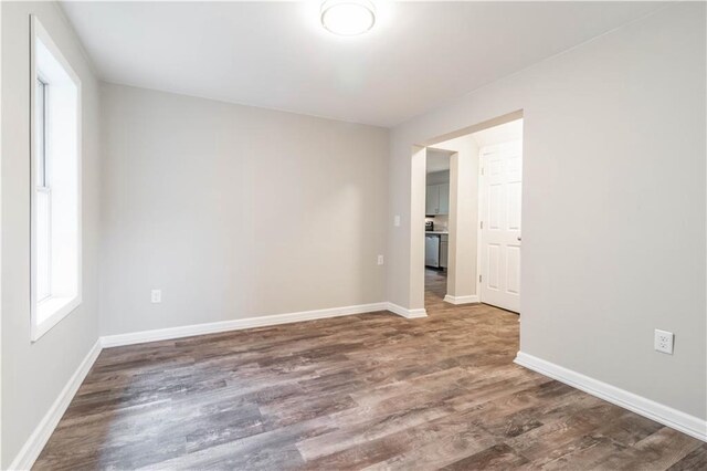 spare room featuring hardwood / wood-style flooring