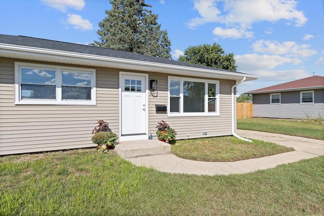 view of front of home with a front yard