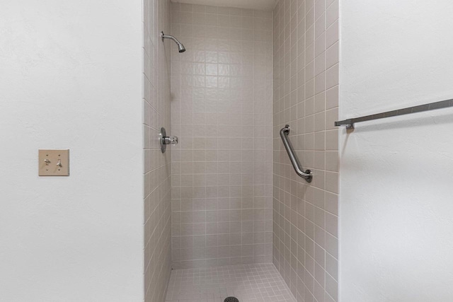 full bath featuring a stall shower