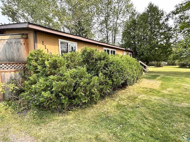 1118 Prentice Ave, Ashland, WI 54806 - view of home's exterior with a yard