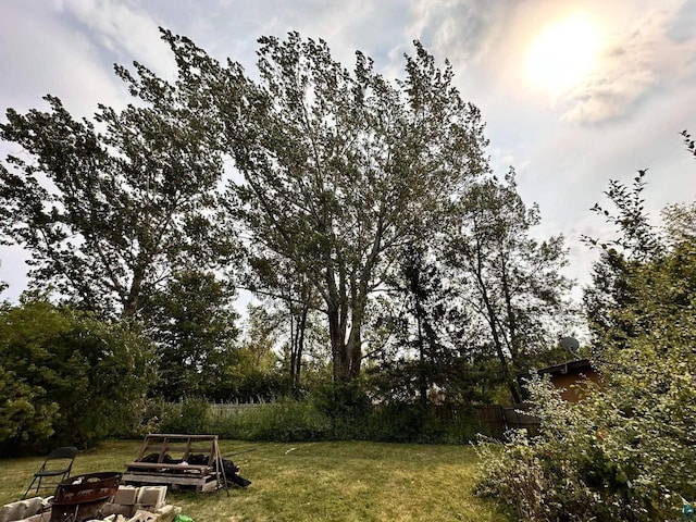 1118 Prentice Ave, Ashland, WI 54806 - view of grassy yard featuring a fire pit