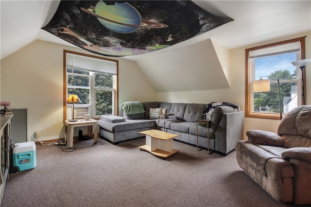 carpeted living room with lofted ceiling