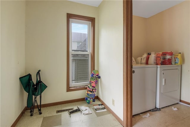 laundry room with washer and clothes dryer