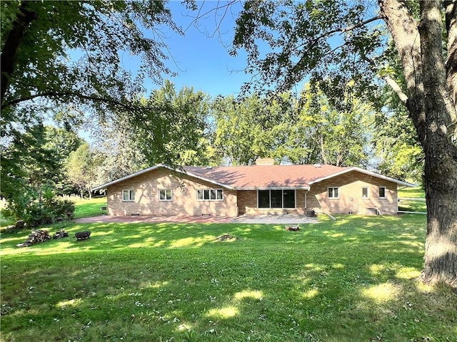 view of front of home with a front lawn