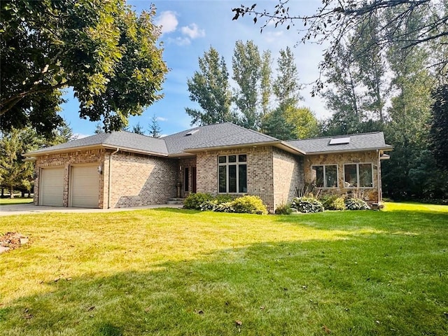 view of front of home with a shingled roof, a front lawn, concrete driveway, a garage, and brick siding