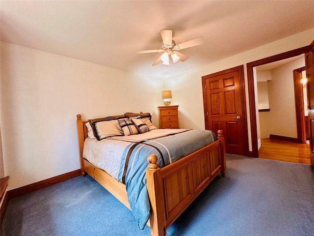 bedroom featuring baseboards, carpet, and a ceiling fan