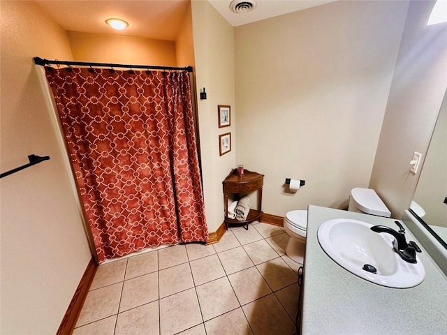 full bathroom with tile patterned floors, toilet, baseboards, and visible vents