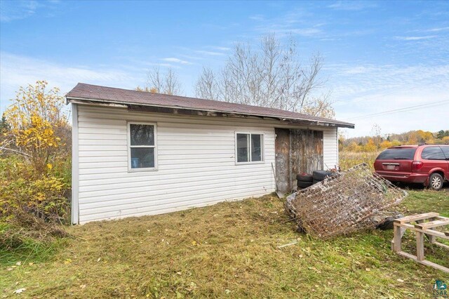 6275 S County Rd A, Superior, WI 54880 - view of home's exterior featuring a yard