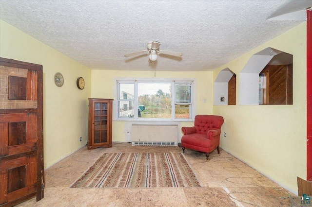 6275 S County Rd A, Superior, WI 54880 - sitting room featuring a ceiling fan and a textured ceiling
