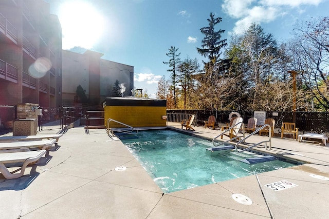 view of pool with a patio