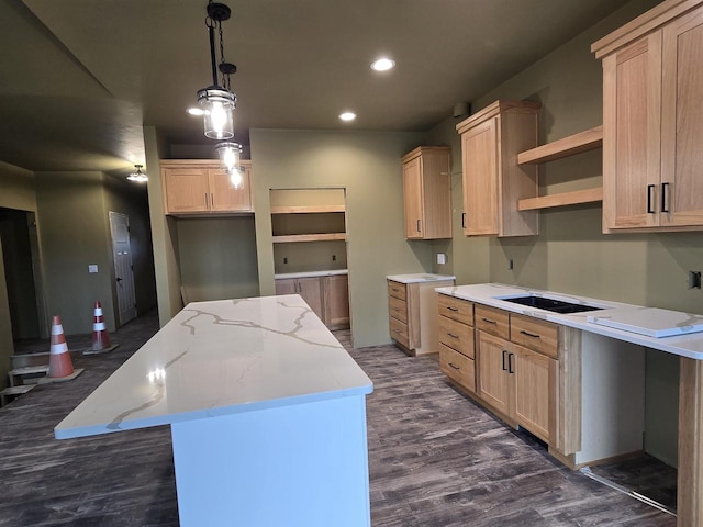 kitchen featuring light brown cabinetry, open shelves, dark wood finished floors, and a center island