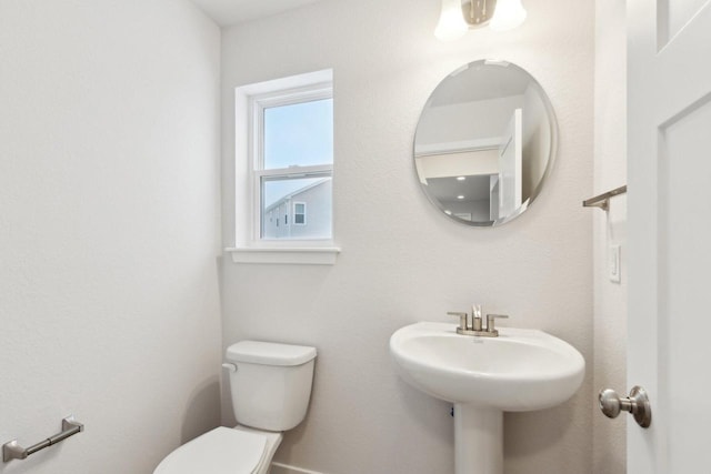 bathroom featuring toilet