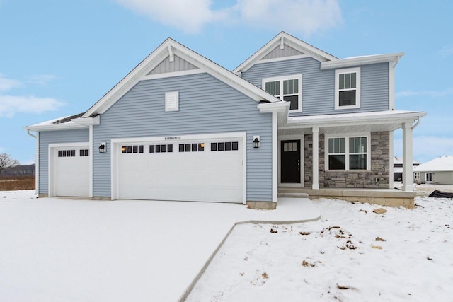 craftsman-style home with a porch and a garage