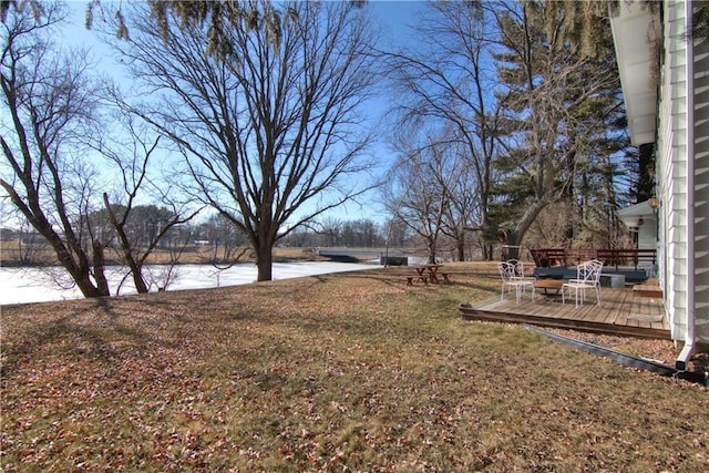 view of yard featuring a wooden deck