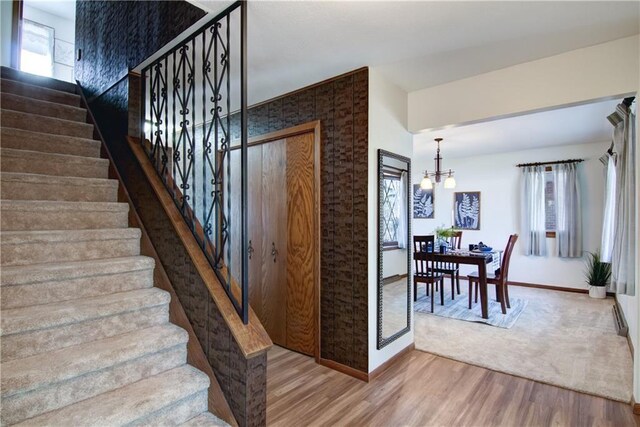 hall with light wood-type flooring