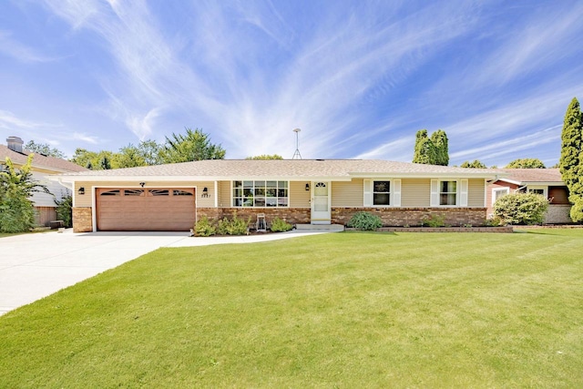 ranch-style house with a front yard, concrete driveway, brick siding, and an attached garage