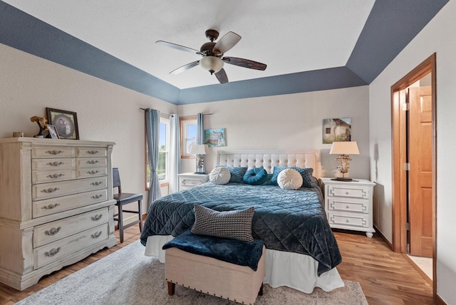 bedroom featuring ceiling fan and light hardwood / wood-style floors