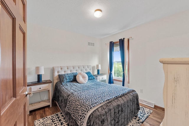 bedroom featuring wood-type flooring