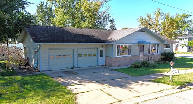 ranch-style home featuring a front yard and a garage