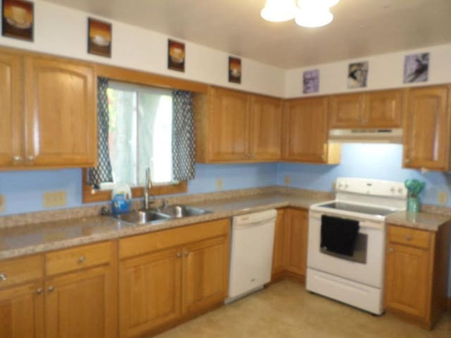 kitchen with sink and white appliances