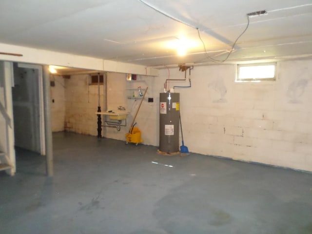 basement with sink and water heater