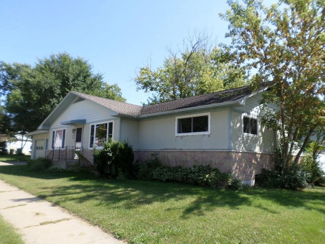 view of front of home with a front yard