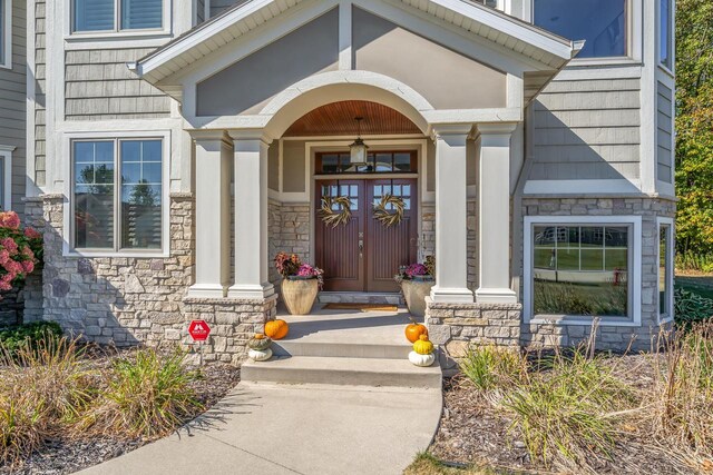 property entrance with covered porch