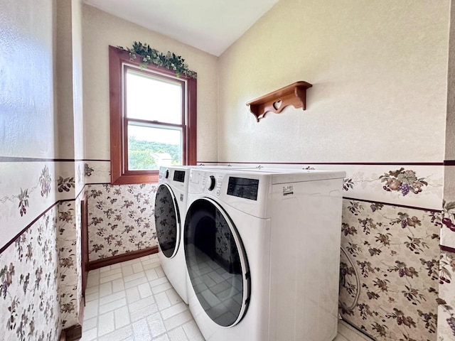 laundry area with separate washer and dryer