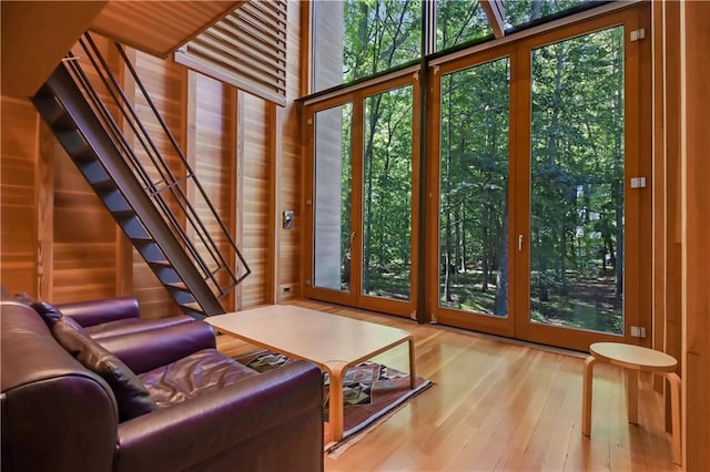 doorway to outside with wood-type flooring