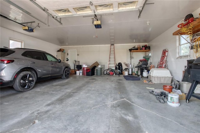 garage featuring a garage door opener