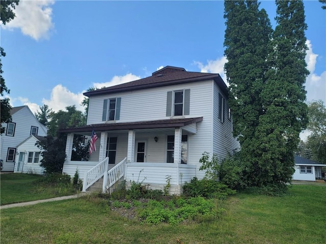 view of property with a porch and a front lawn