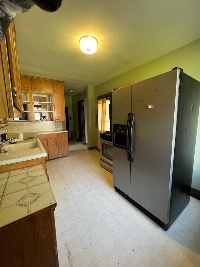 kitchen with appliances with stainless steel finishes and sink